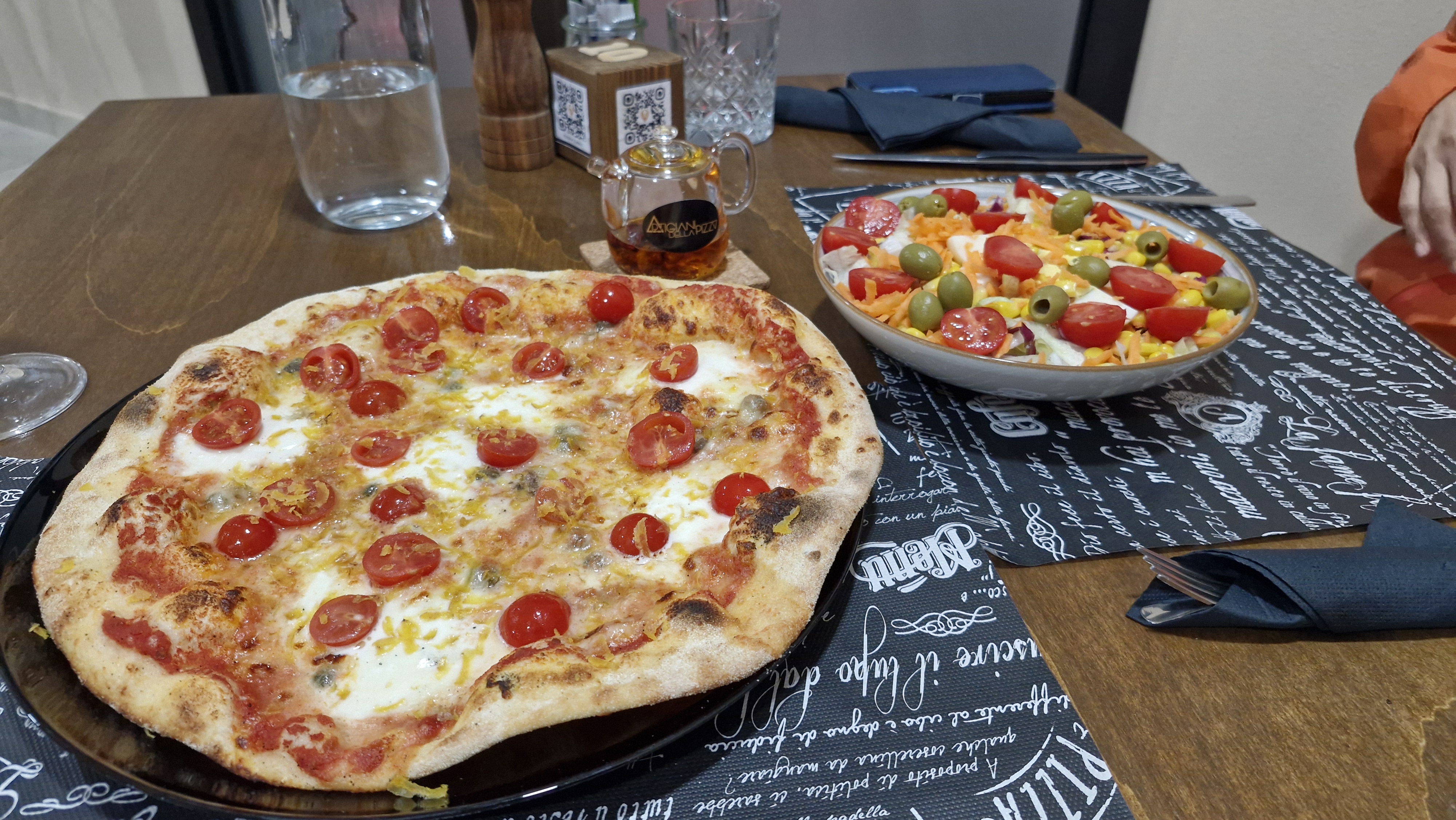 Enjoying a delicious pizza dinner in Muravera.